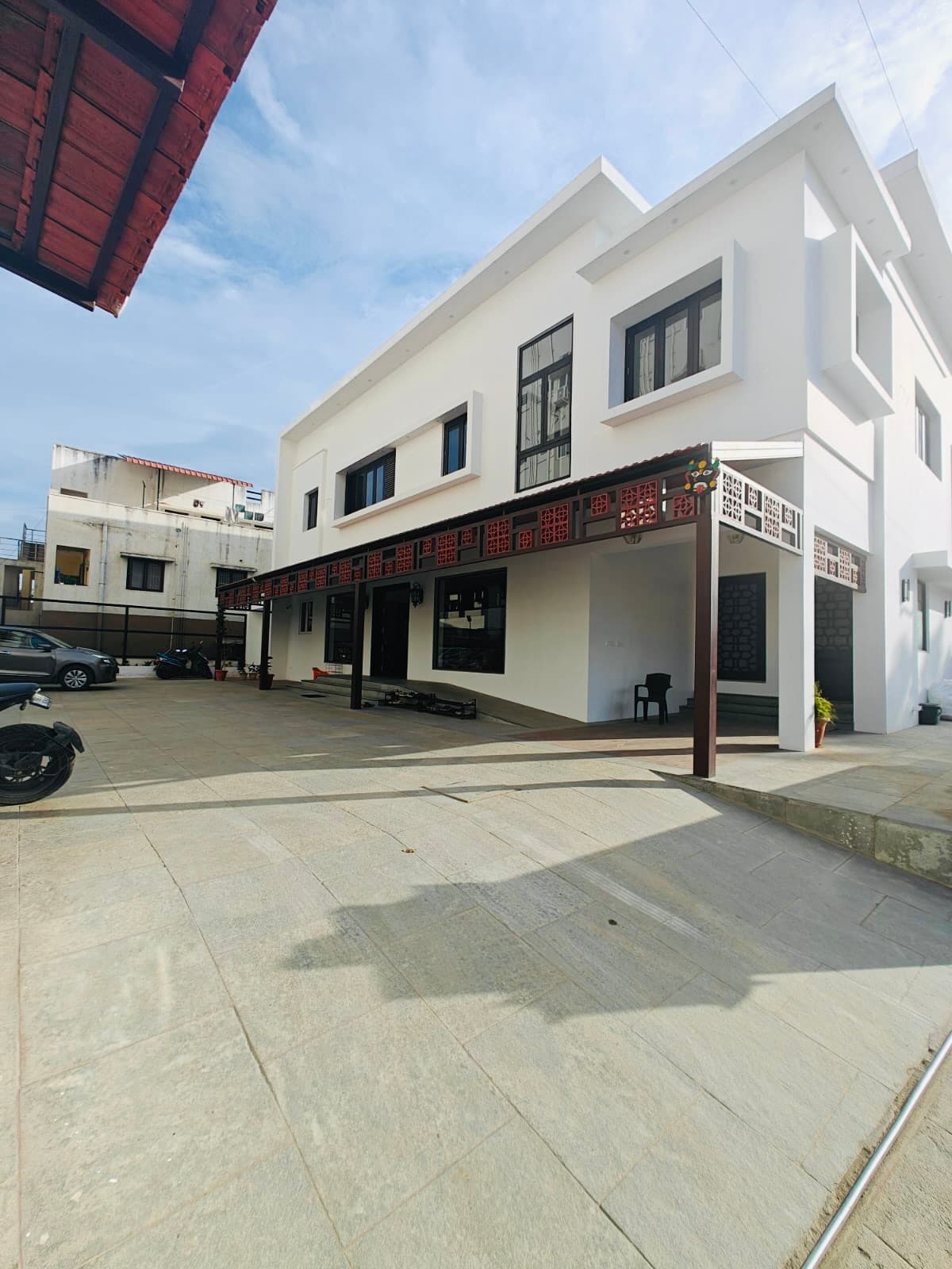 The clinic from inside the courtyard, veranda running the length of the building
